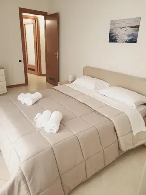 Letto o letti in una camera di Appartamenti Le Gemme