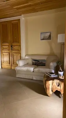 Area soggiorno di Maison Des Fleurs