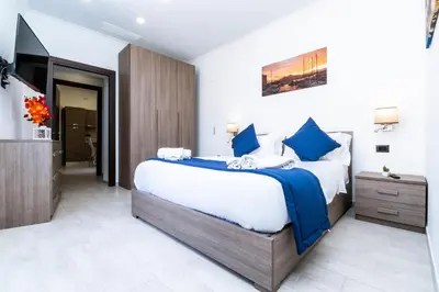 Letto o letti in una camera di Palazzo Settembrini 49