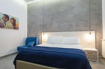 Letto o letti in una camera di Casa Nora Napoli