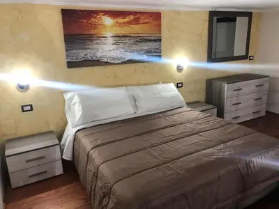 Letto o letti in una camera di FORIA 58 APARTAMENTS