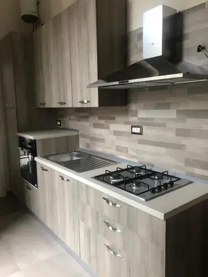 Cucina o angolo cottura di FORIA 58 APARTAMENTS