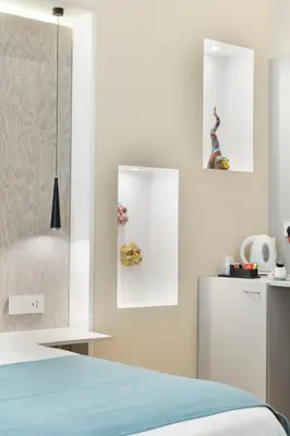 Letto o letti in una camera di DIMORA DUOMO