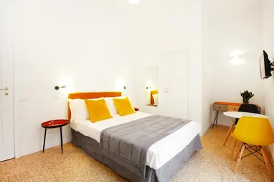 Letto o letti in una camera di Le Quinte del Bellini