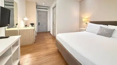 Letto o letti in una camera di Prestige Rooms Chiaia