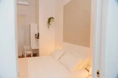 Letto o letti in una camera di Interno21