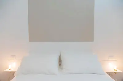 Letto o letti in una camera di Interno21