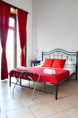 Letto o letti in una camera di Vico 22 Rooms Napoli