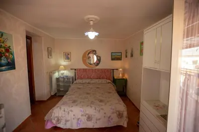 Letto o letti in una camera di Via Emanuele de Deo, 23 Casa vacanze
