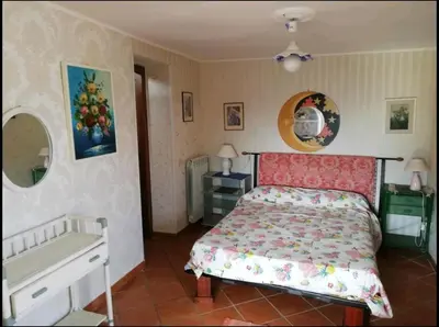 Letto o letti in una camera di Via Emanuele de Deo, 23 Casa vacanze