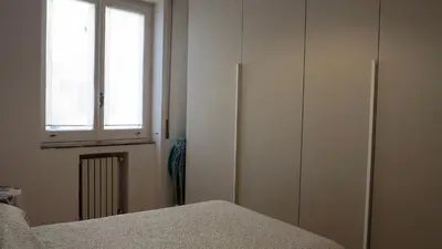 Letto o letti in una camera di Spacious panoramic apartment - half way Center-Vomero district
