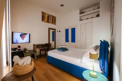 Letto o letti in una camera di Dimora Megaride