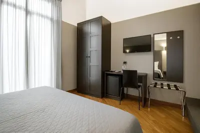 Letto o letti in una camera di Piazza Carità