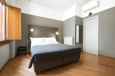 Letto o letti in una camera di Piazza Carità