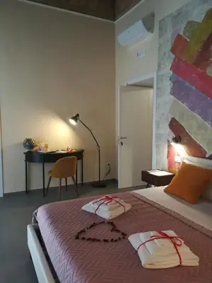 Letto o letti in una camera di L'arco e il vico