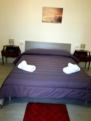 Letto o letti in una camera di I Tetti Del Centro Storico