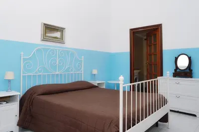 Letto o letti in una camera di Camera Con Vista Apartments