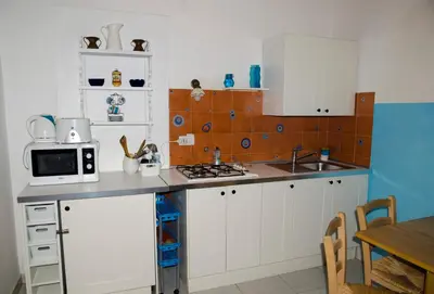 Cucina o angolo cottura di Camera Con Vista Apartments