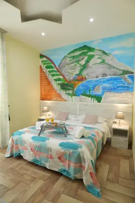 Letto o letti in una camera di Authentic Neapolis in the hearth of the center
