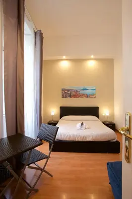 Letto o letti in una camera di B&B MetròNapoli