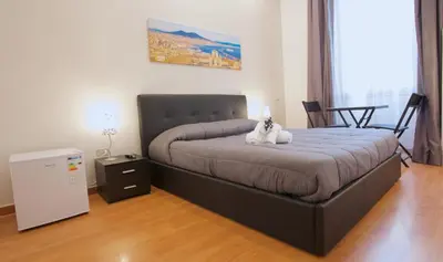 Letto o letti in una camera di B&B MetròNapoli