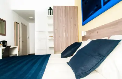 TV o dispositivi per l'intrattenimento presso Demi Rooms