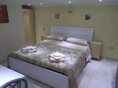Letto o letti in una camera di La Mansardina