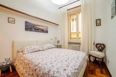 Letto o letti in una camera di Luci di S. Chiara