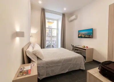 Letto o letti in una camera di Neapolitan Breakfast
