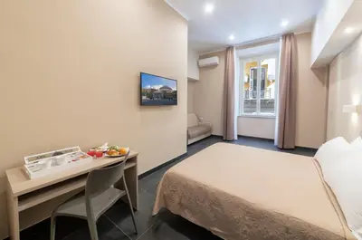 Letto o letti in una camera di Neapolitan Breakfast
