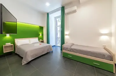 Letto o letti in una camera di Neapolitan Breakfast