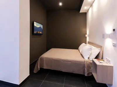 Letto o letti in una camera di Neapolitan Breakfast