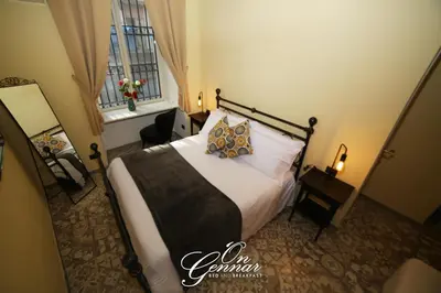 Letto o letti in una camera di On Gennar