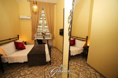 Letto o letti in una camera di On Gennar