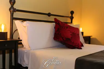 Letto o letti in una camera di On Gennar