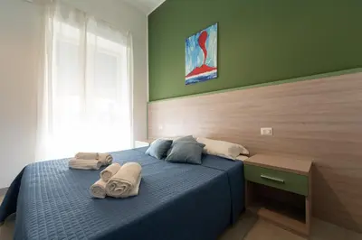 Letto o letti in una camera di L'Orto del Conte