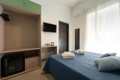 Letto o letti in una camera di L'Orto del Conte