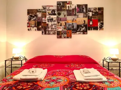 Letto o letti in una camera di Casa G&G Pignasecca 2 nel cuore di Napoli