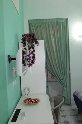 Letto o letti in una camera di Viaggio a Napoli B&B