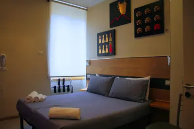 Letto o letti in una camera di QuiSiSta