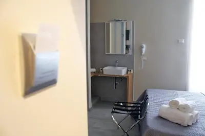 Letto o letti in una camera di QuiSiSta