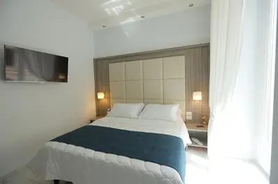 Letto o letti in una camera di Garibaldi Suite