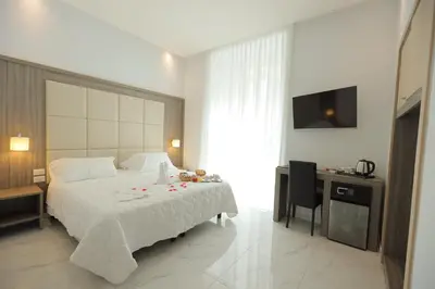 Letto o letti in una camera di Garibaldi Suite
