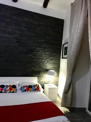 Letto o letti in una camera di FRANZ GUEST HOUSE