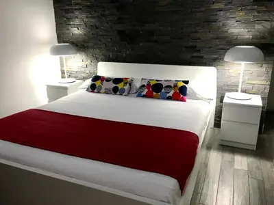 Letto o letti in una camera di FRANZ GUEST HOUSE