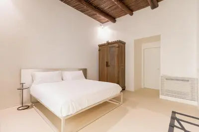 Letto o letti in una camera di SPAZIO CMM- Sant'Arpino