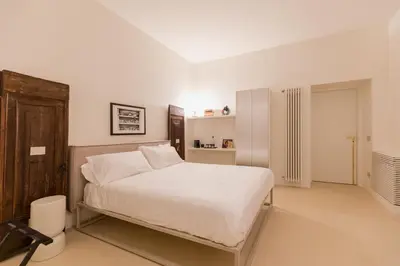 Letto o letti in una camera di SPAZIO CMM- Sant'Arpino