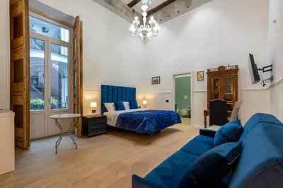 Letto o letti in una camera di Il Tesoro Smart Suite & SPA