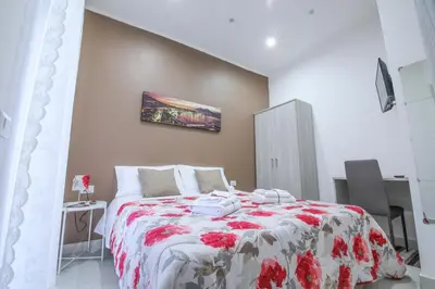 Letto o letti in una camera di Il vicoletto di Santa Lucia