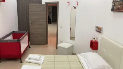 Letto o letti in una camera di Ginevra’s Apartment